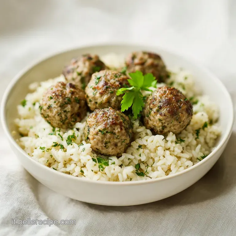 Perfectly browned lamb meatballs artfully arranged on a white plate, garnished with fresh rosemary and a drizzle of flavor...